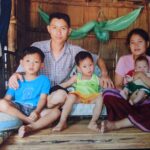 Fairymoo and her family in Thai refugee camp.